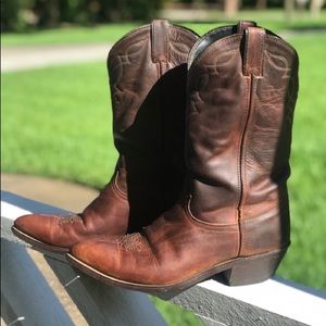 Lightly used brown cowboy boot